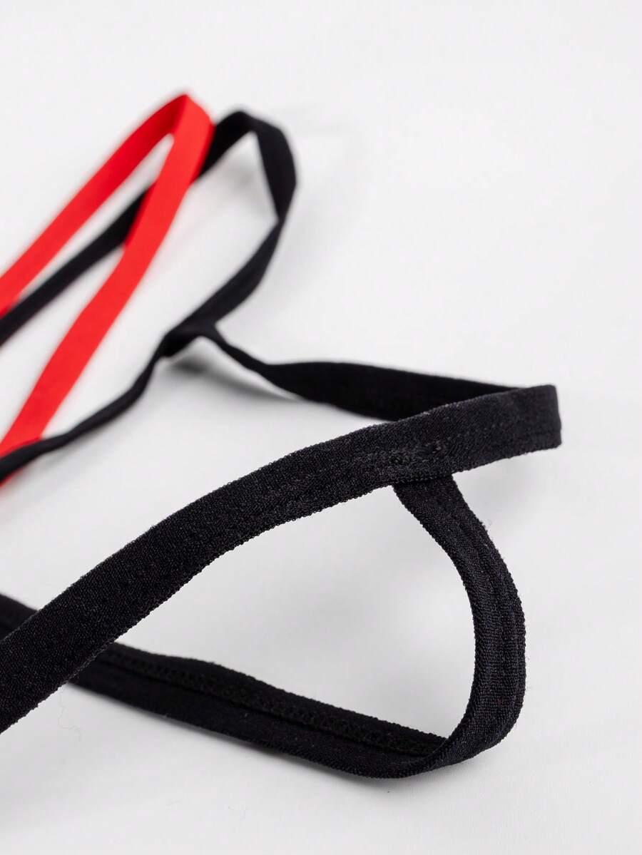 Men's low-rise thong underwear with multicolor colorblock design and contrast trim