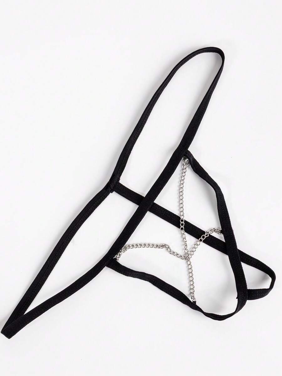 Black men's low rise thong underwear with chain detail and colorblock knitted fabric design