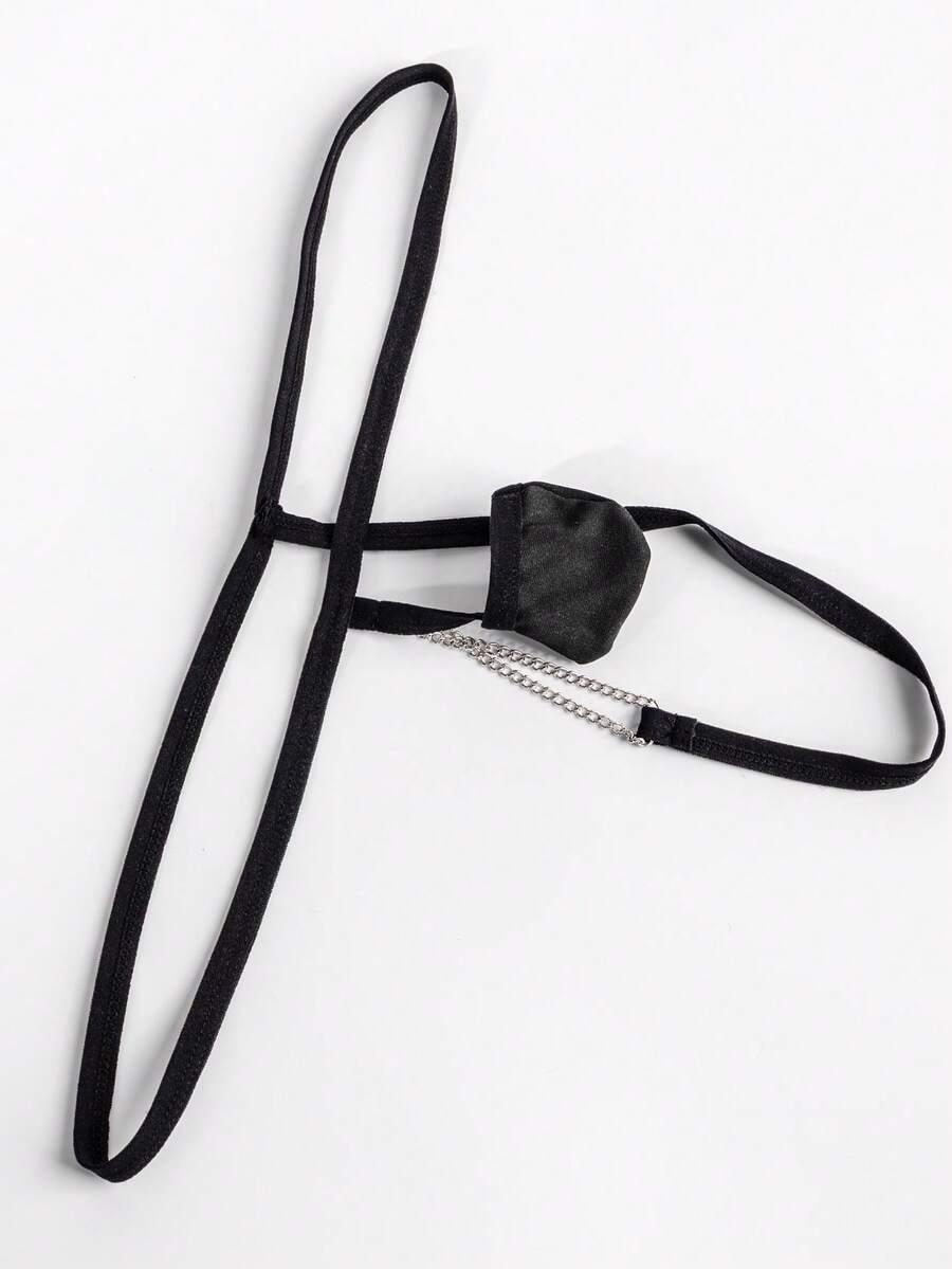 Black men's mid-waist thong underwear featuring a non-slip design and colorblock geometric letter pattern.