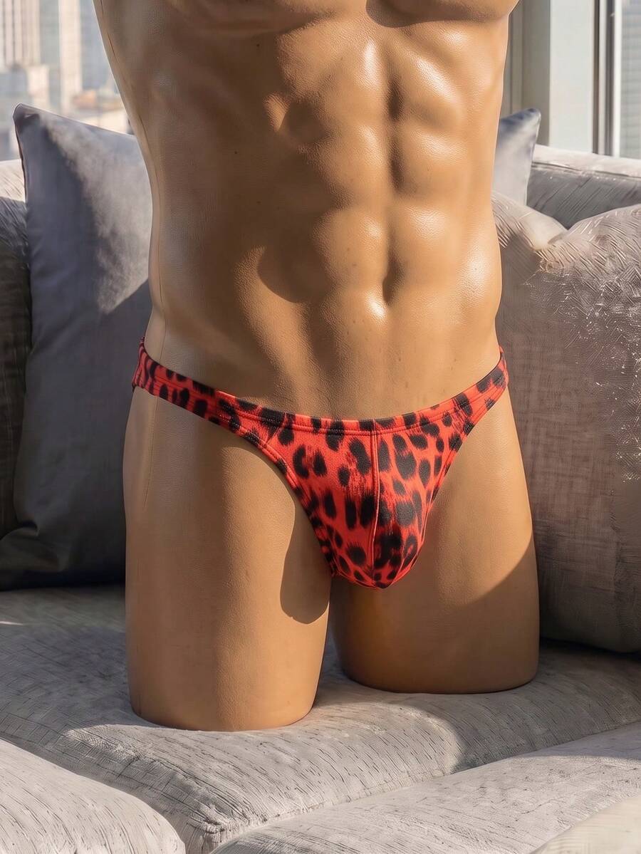 Men's leopard print thong underwear featuring a low-rise fit and high-stretch multicolor fabric.