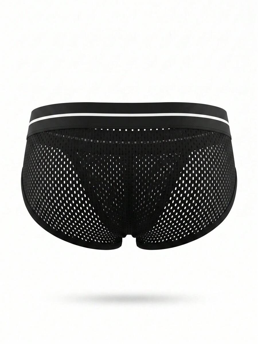 Black men's low rise triangle briefs featuring a colorblock design and letter tape waist detail.