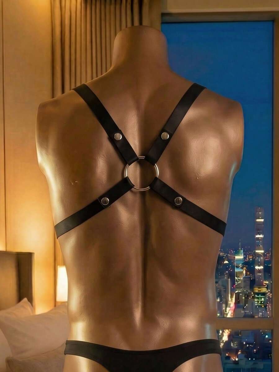 Men's black criss cross sexy vest top featuring metal decor and medium stretch fabric.