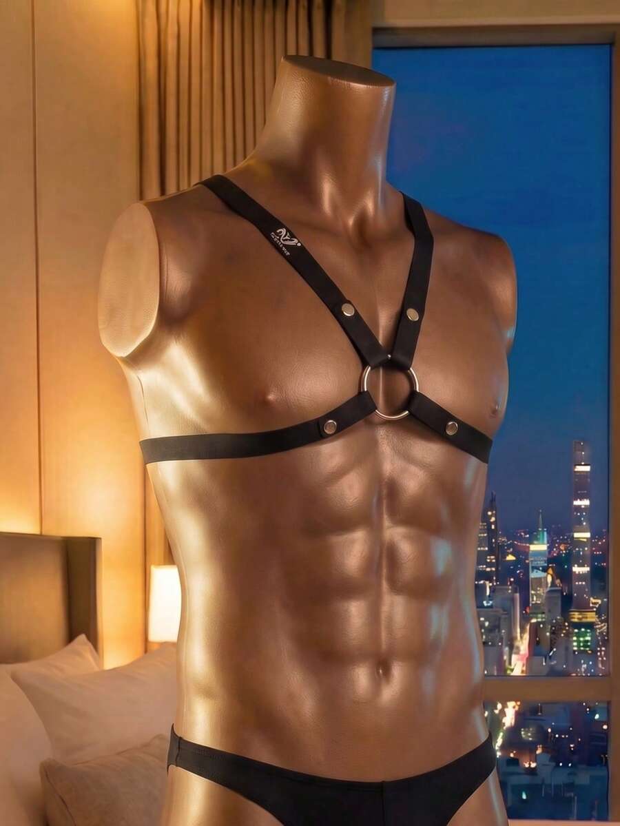 Men's black criss cross sexy vest top featuring metal decor and medium stretch fabric.