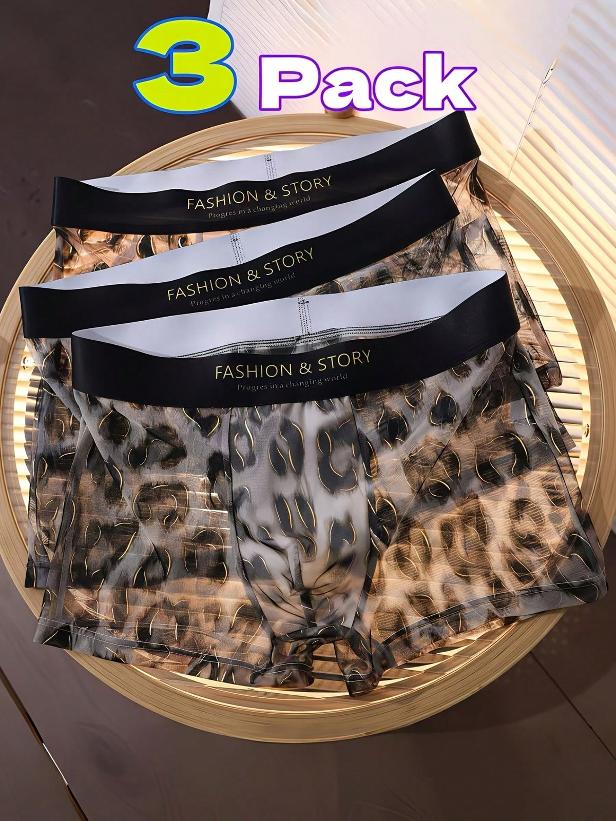 Pack of 3 men's semi-sheer chiffon boxer briefs in mixed colors featuring a high-rise waist and high stretch fabric.