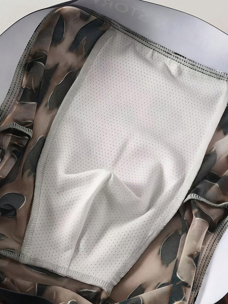 Pack of 3 men's semi-sheer chiffon boxer briefs in mixed colors featuring a high-rise waist and high stretch fabric.
