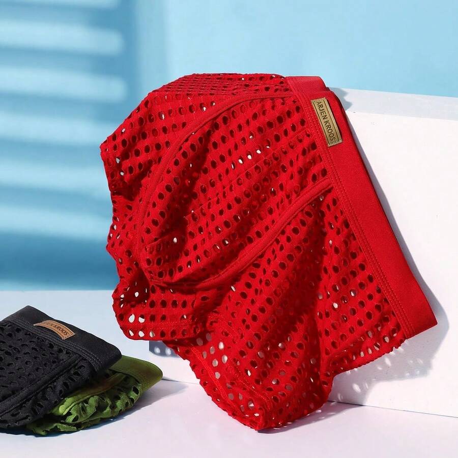 Men's breathable mesh trunk underwear featuring plain contrast mesh design and quick-drying polyester fabric.