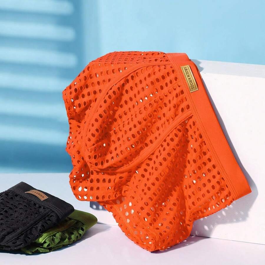 Men's breathable mesh trunk underwear featuring plain contrast mesh design and quick-drying polyester fabric.