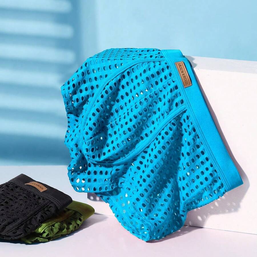Men's breathable mesh trunk underwear featuring plain contrast mesh design and quick-drying polyester fabric.