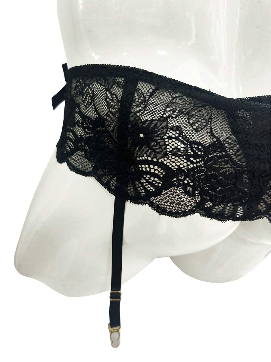 Black low rise men's lace boxer shorts with garter style detail