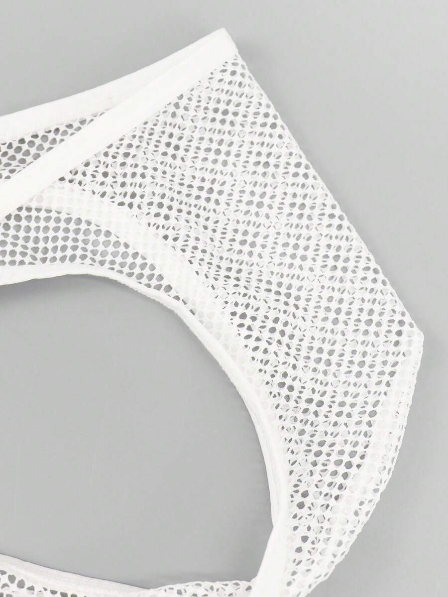 White men's low rise hollow out mesh jockstrap featuring contrast lace detailing and a scoop neck.