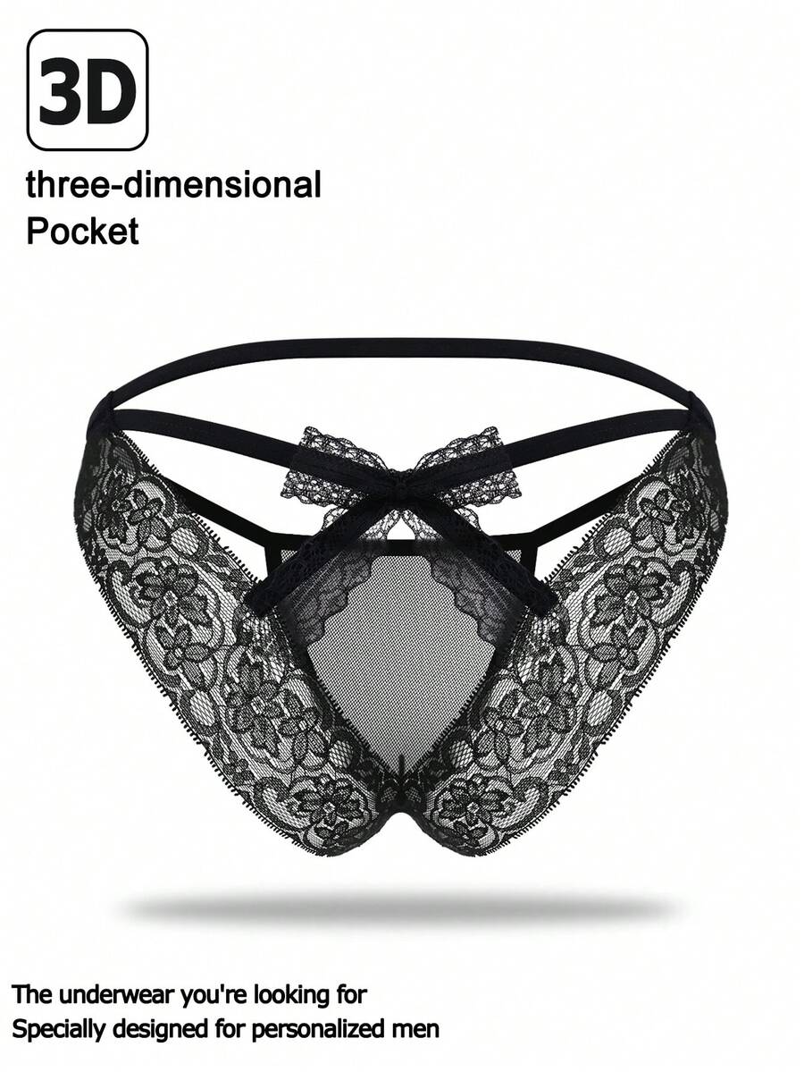 Men's black mesh thong underwear featuring lace trim and bow accent