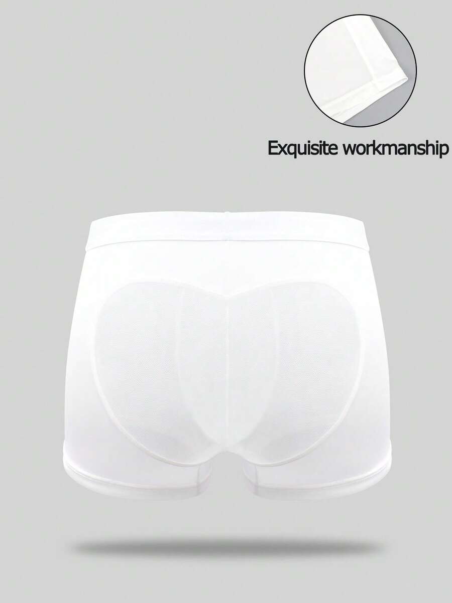 White men's low-rise mesh contrast boxer shorts featuring a plain patchwork design made of stretch fabric.