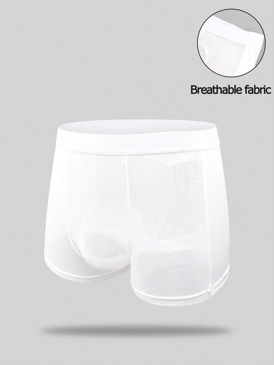 White men's low-rise mesh contrast boxer shorts featuring a plain patchwork design made of stretch fabric.