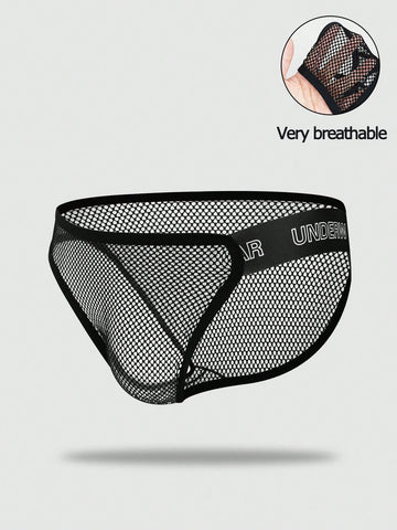 Black men's thong underwear featuring mesh fabric, cut out details, letter pattern, and a low rise fit.