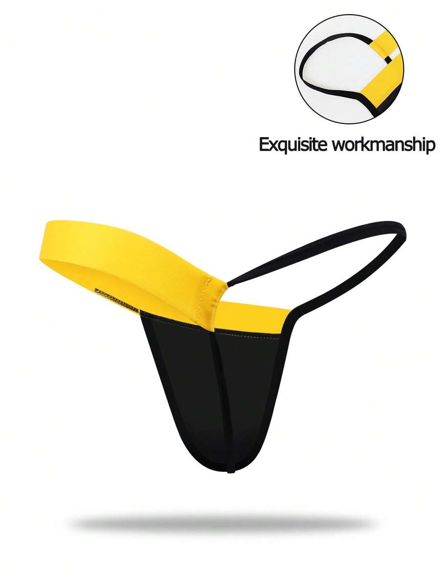 Black low rise men's thong underwear with embroidery detail on knitted fabric.