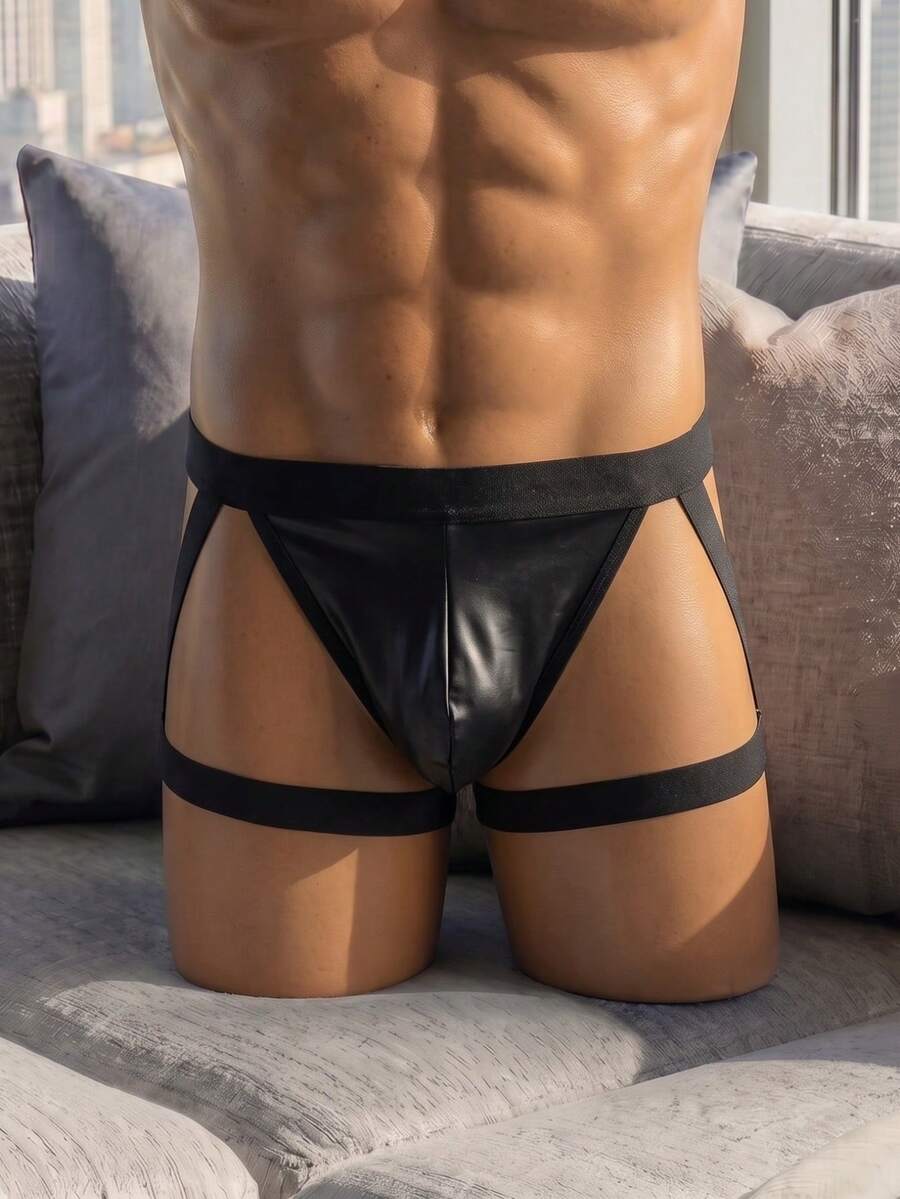 Men's low rise solid black PU boxer briefs featuring a sleek unlined design with medium stretch.