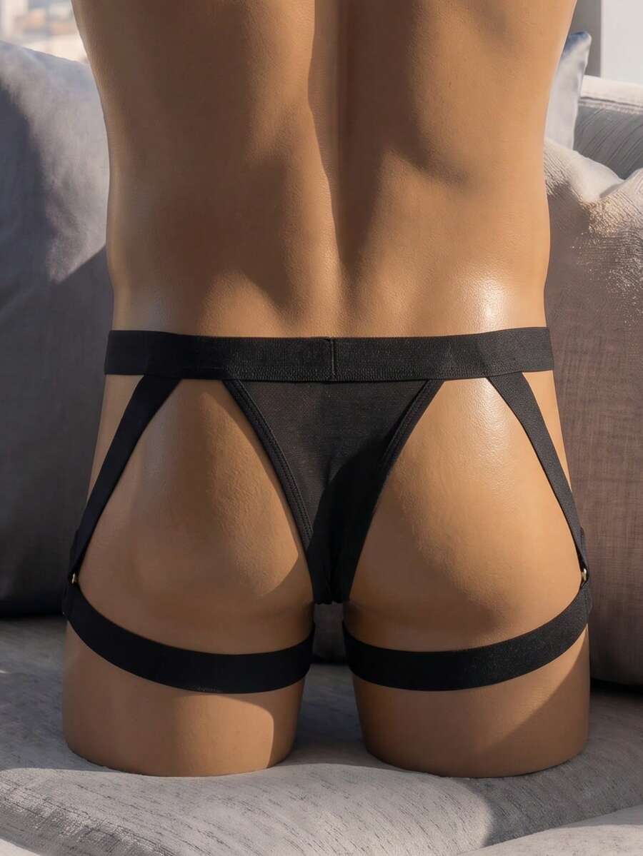 Men's low rise solid black PU boxer briefs featuring a sleek unlined design with medium stretch.