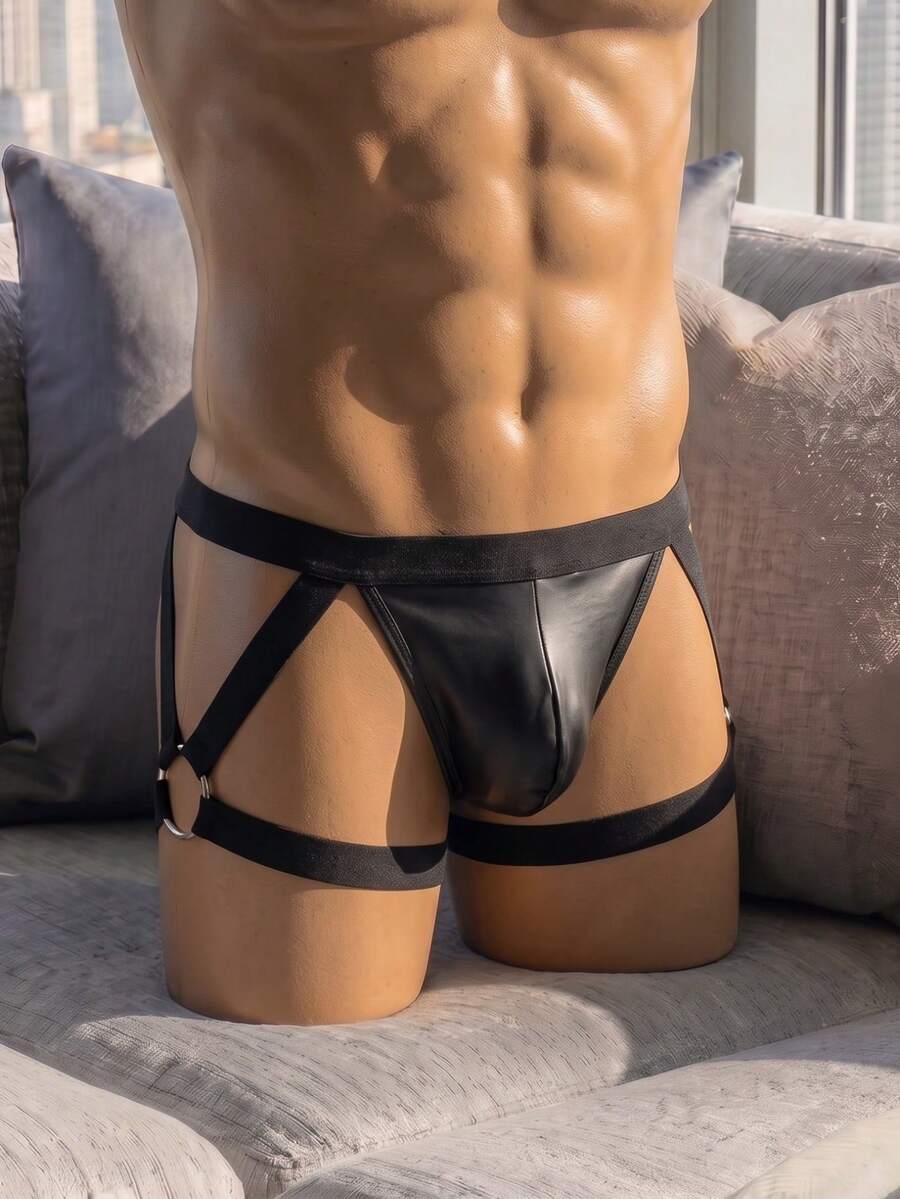 Men's low rise solid black PU boxer briefs featuring a sleek unlined design with medium stretch.