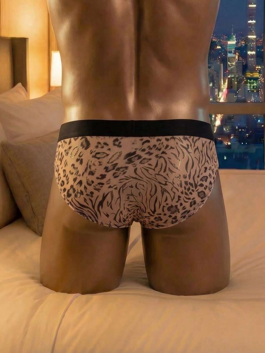 Men's low rise brief in coffee brown featuring a textured pattern and medium stretch fabric.