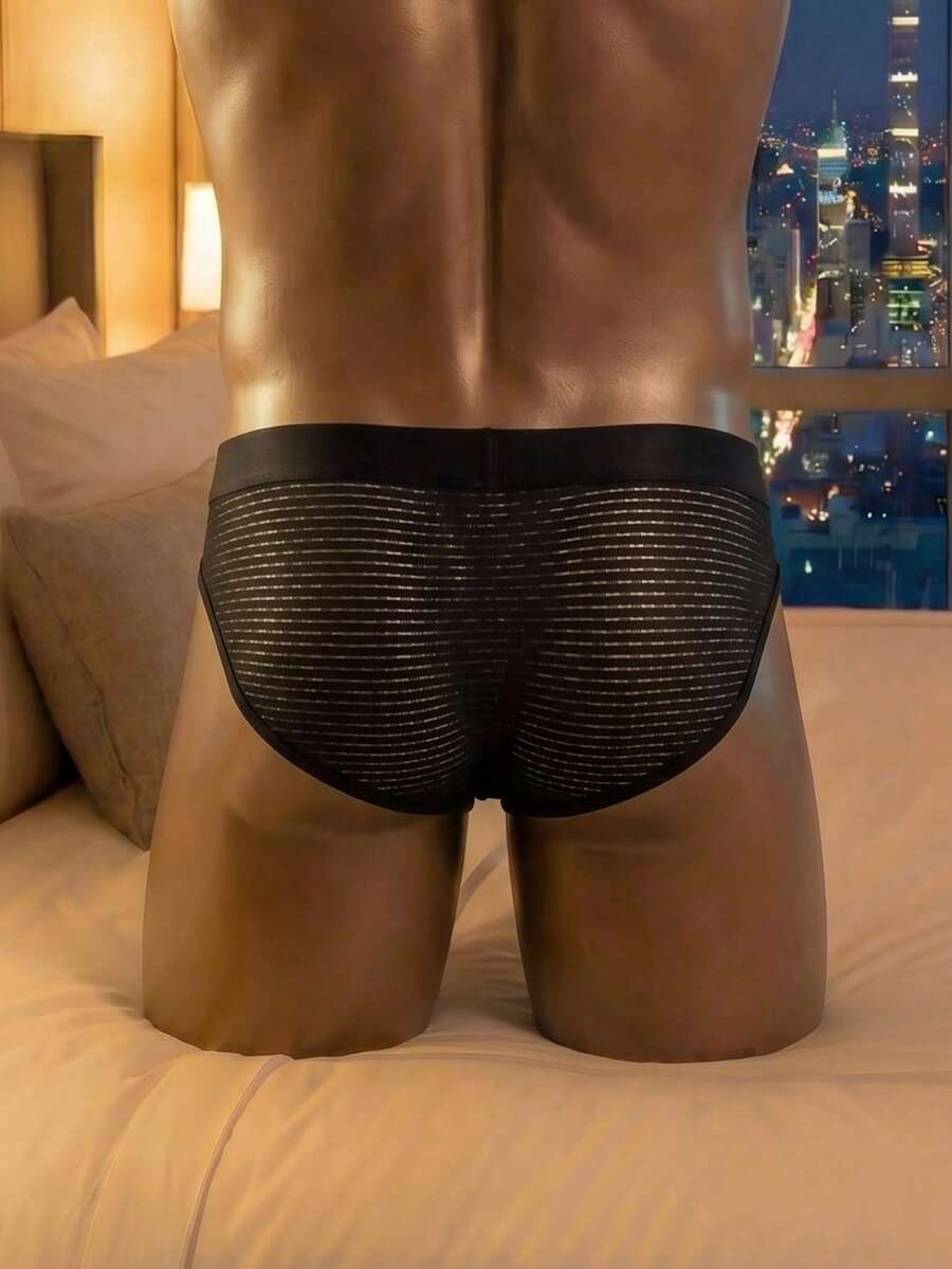 Black men's ice silk high cut briefs featuring a low rise waist and colorblock design.