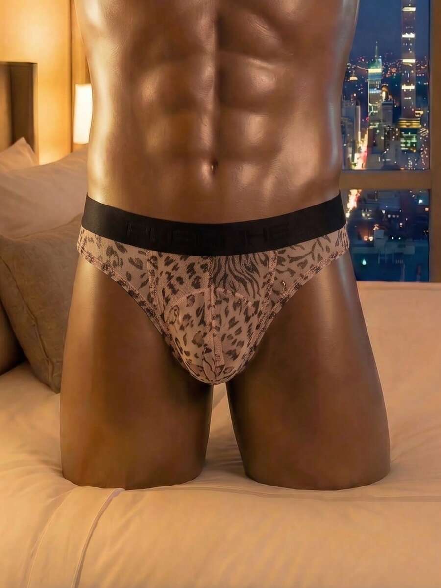 Men's low rise brief in coffee brown featuring a textured pattern and medium stretch fabric.