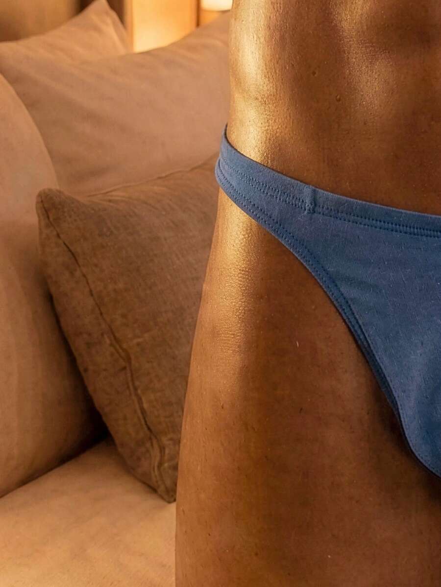 3-pack of men's low-rise solid color thongs made from high-stretch polyamide blend fabric