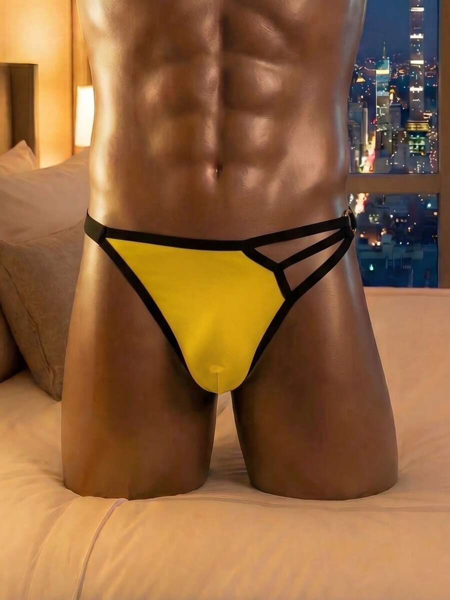 Yellow colorblock men's low rise thong underwear with contrast binding detail.