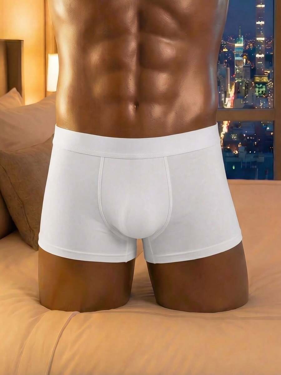 White hollow mesh low-rise jockstrap underwear for men made of medium stretch fabric