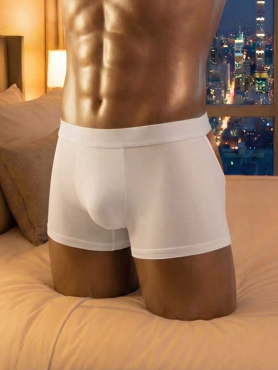 White hollow mesh low-rise jockstrap underwear for men made of medium stretch fabric