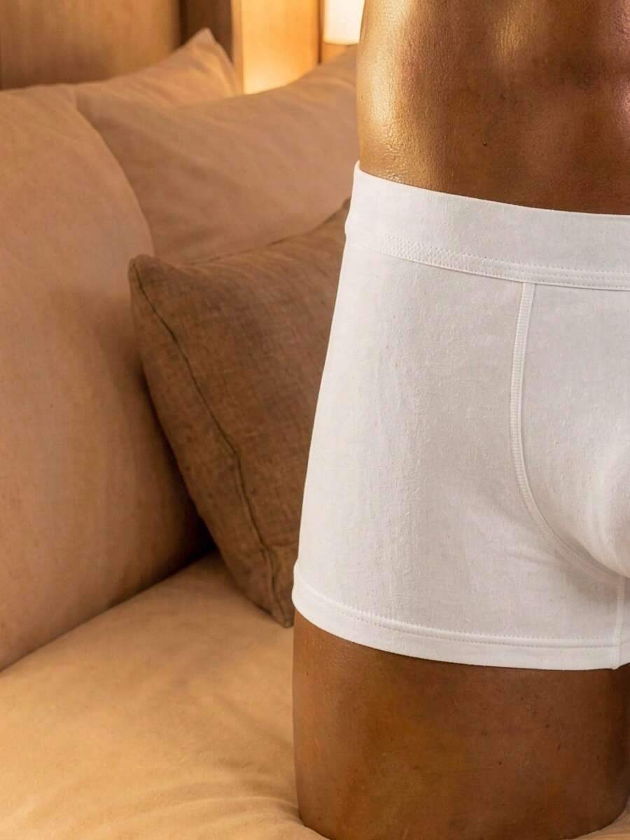 White hollow mesh low-rise jockstrap underwear for men made of medium stretch fabric