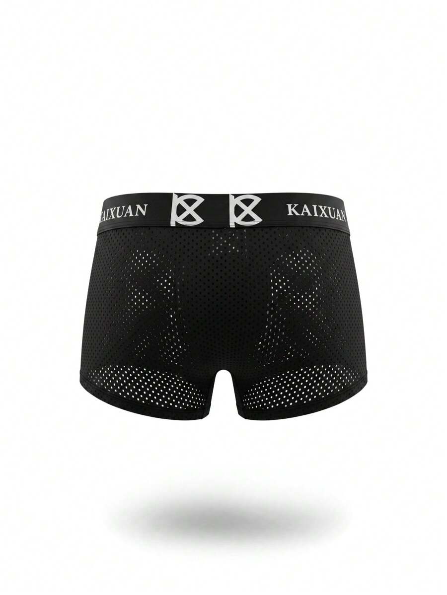 Men's solid black low rise cup boxer briefs crafted from polyamide stretch fabric
