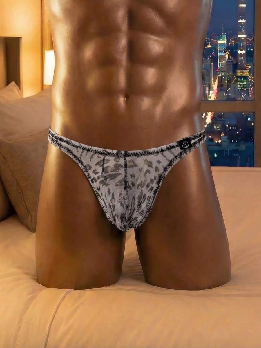 Grey low-rise men's mesh triangle briefs featuring a textured leopard print pattern.