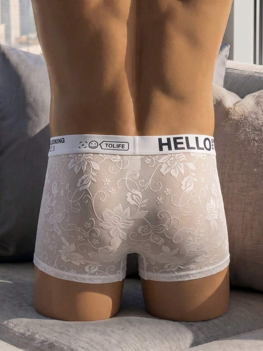White plain low-rise mesh boxer shorts for men featuring medium stretch fabric and tape detailing.