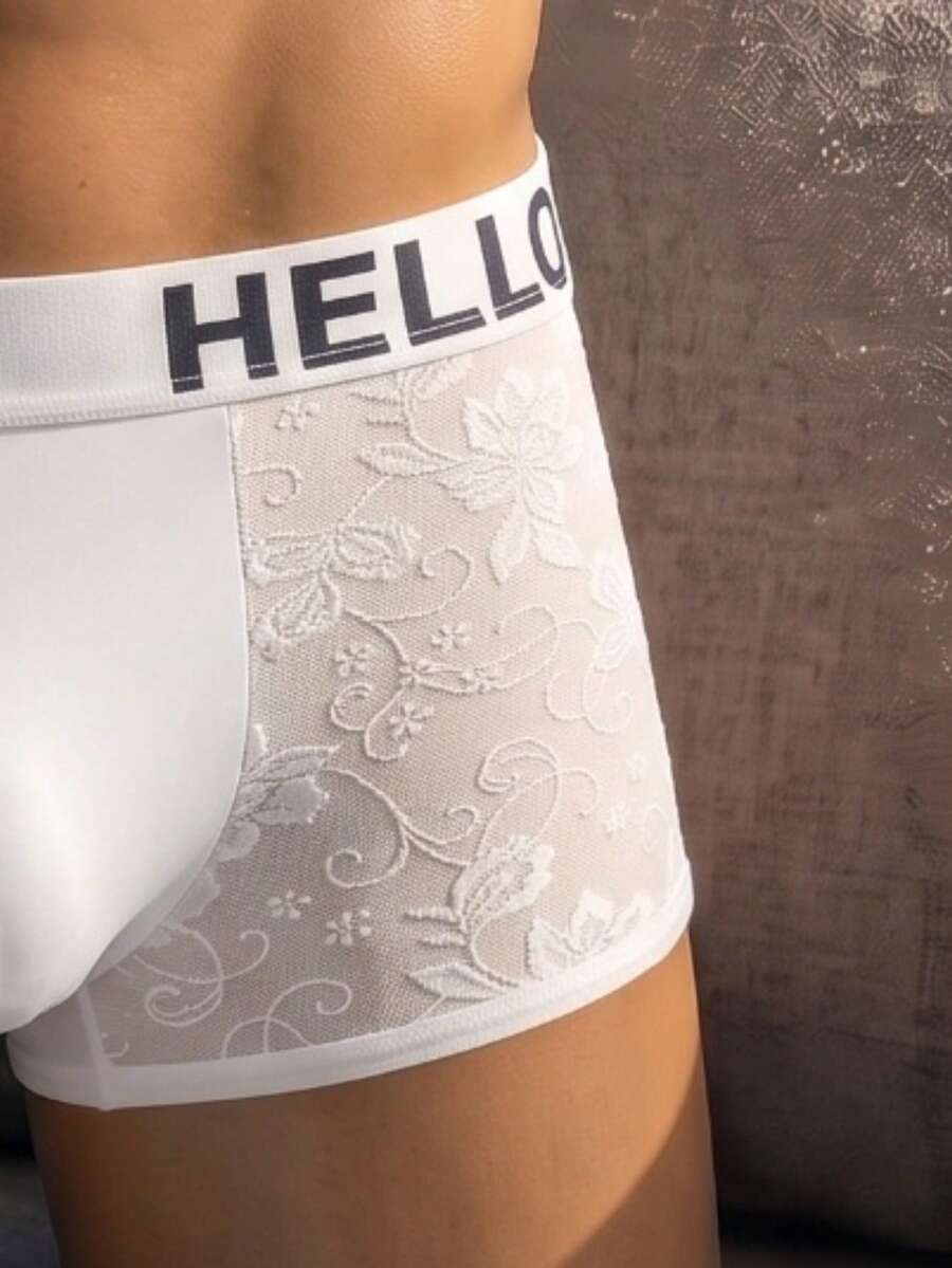 White plain low-rise mesh boxer shorts for men featuring medium stretch fabric and tape detailing.
