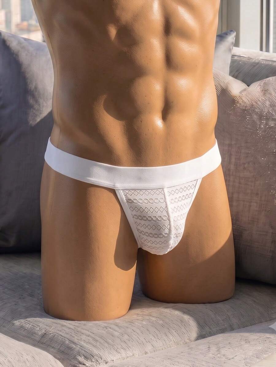 White low rise men's mesh thong underwear featuring a colorblock style.