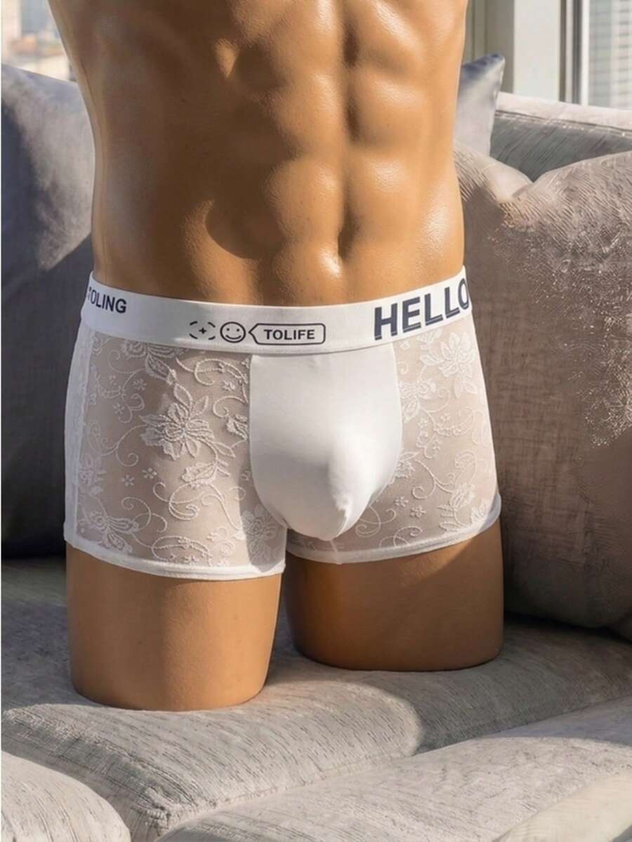 White plain low-rise mesh boxer shorts for men featuring medium stretch fabric and tape detailing.