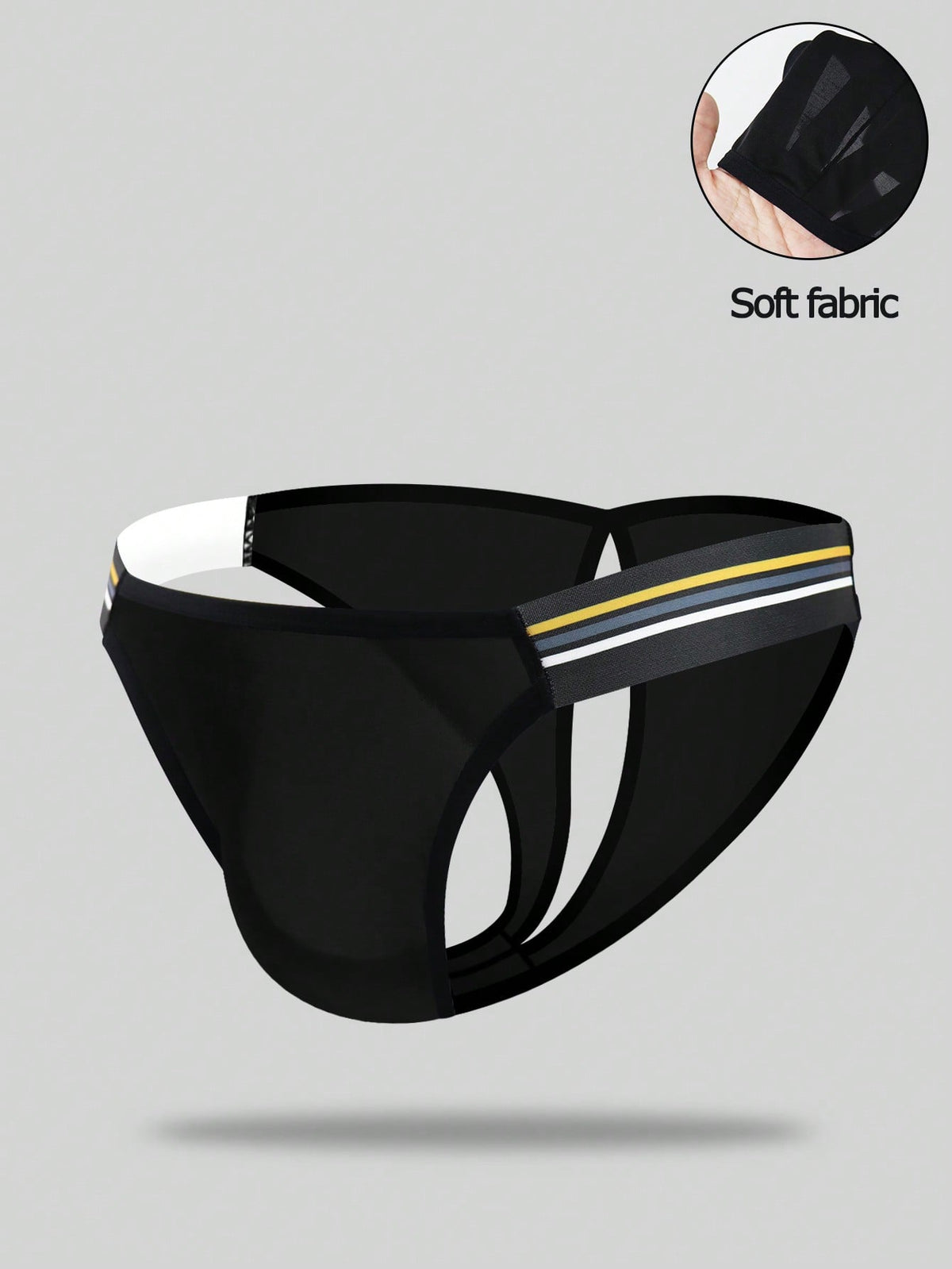Black low-rise men's jockstrap underwear crafted from medium stretch knitted fabric.
