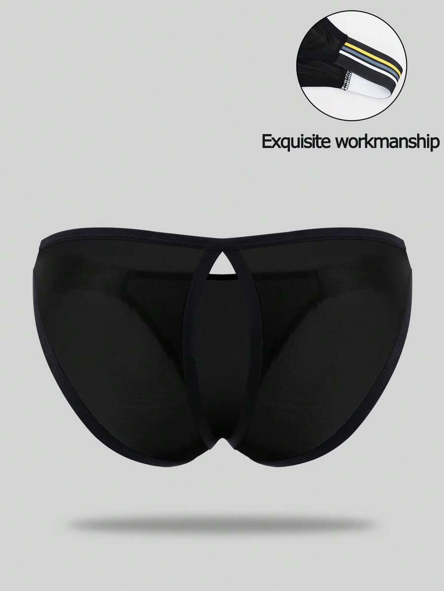Black low-rise men's jockstrap underwear crafted from medium stretch knitted fabric.
