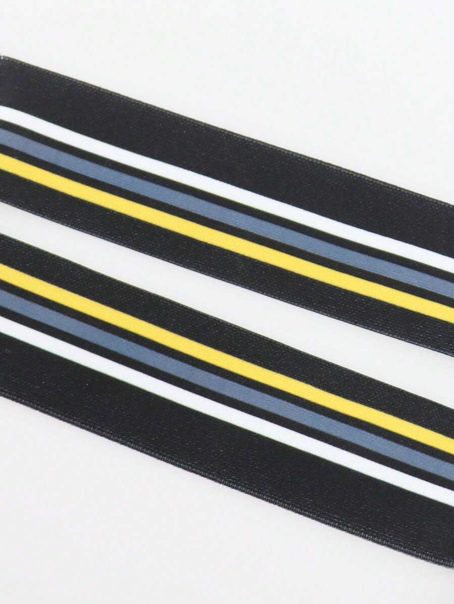 Black low-rise men's jockstrap underwear crafted from medium stretch knitted fabric.