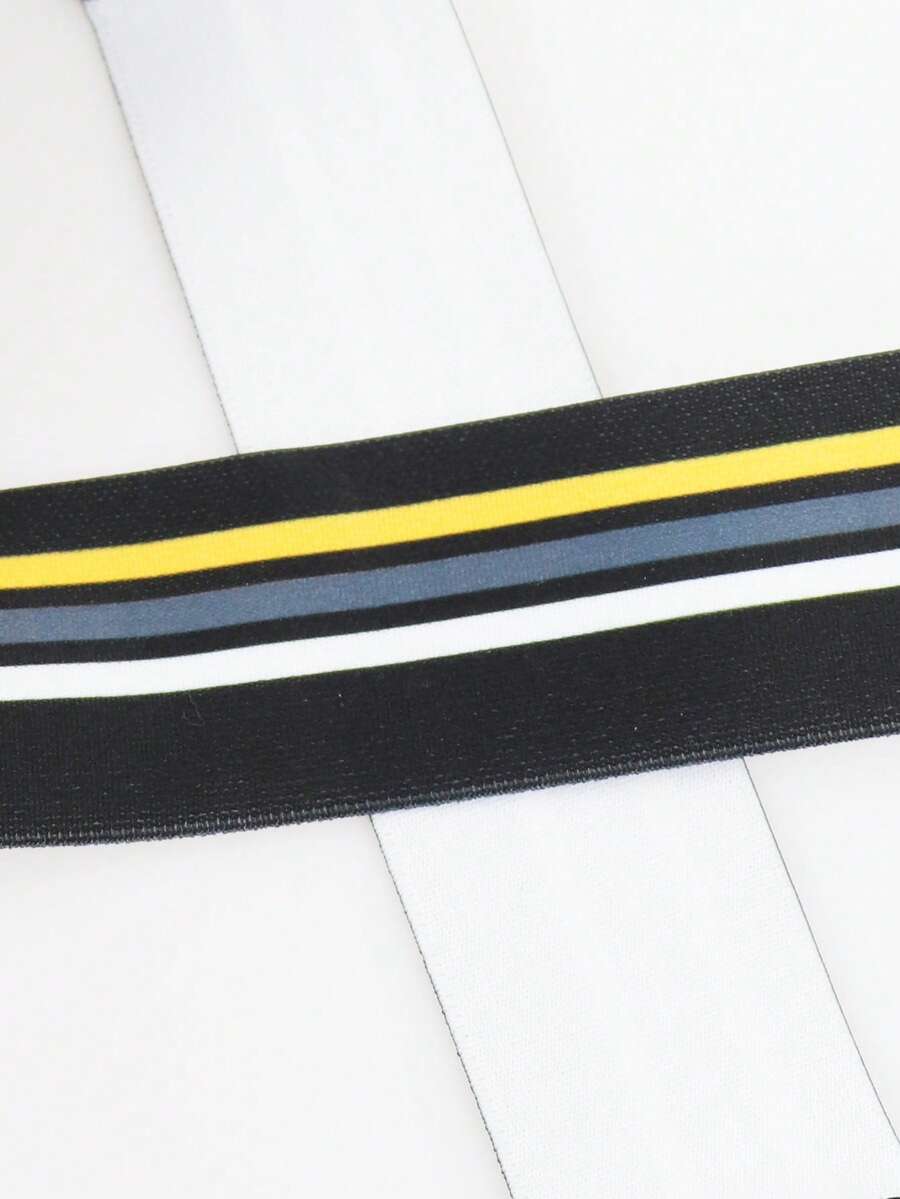 Black low-rise men's jockstrap underwear crafted from medium stretch knitted fabric.