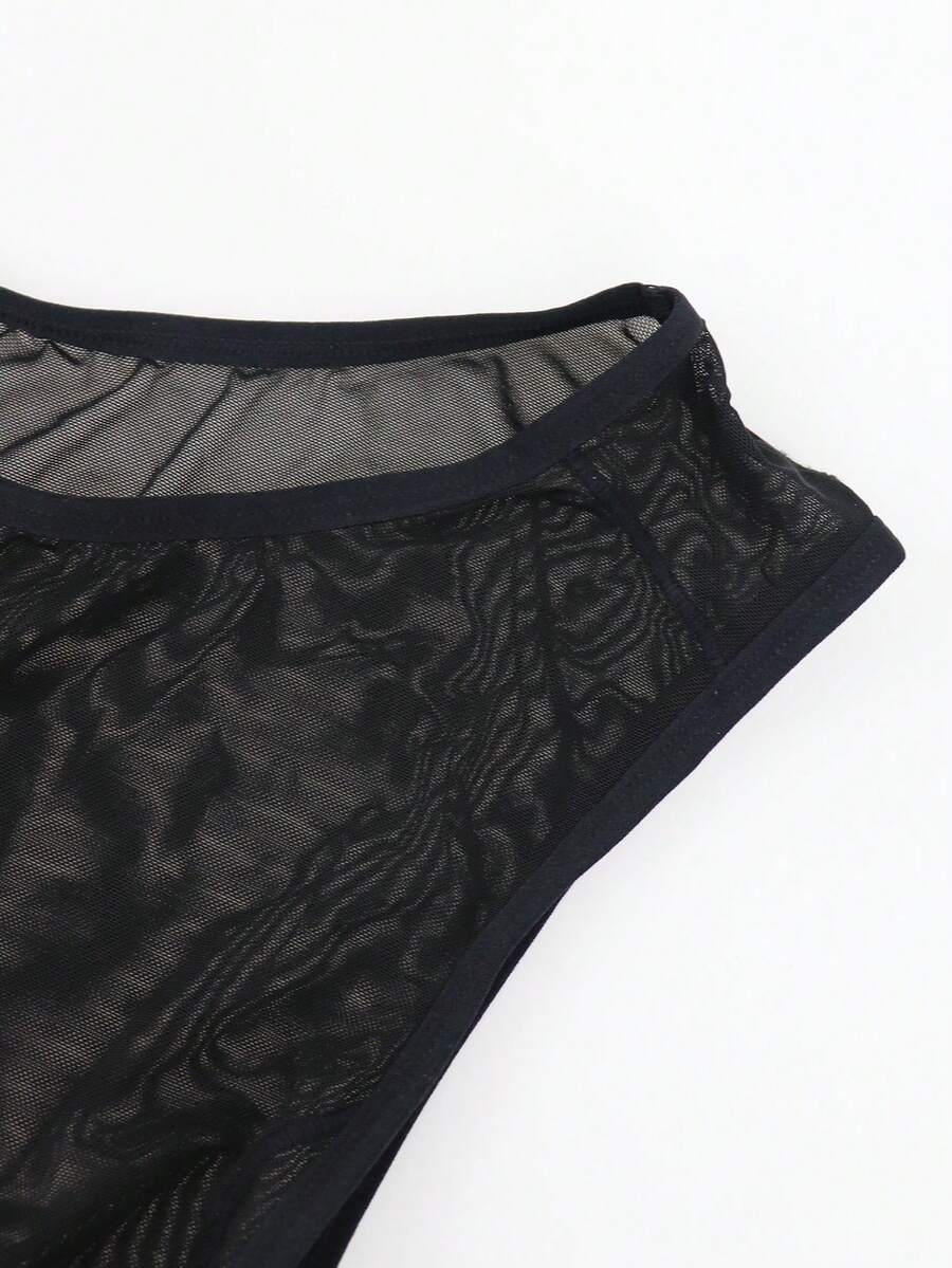 Black hollow mesh bodysuit boxer shorts for men with mid rise waist and stretch fabric