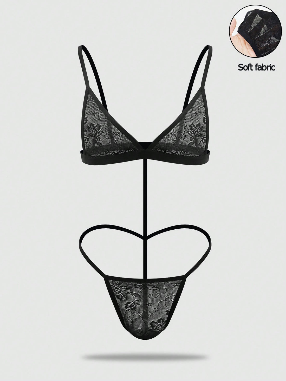 Men's black mesh thong underwear featuring a low-rise fit and backless design.
