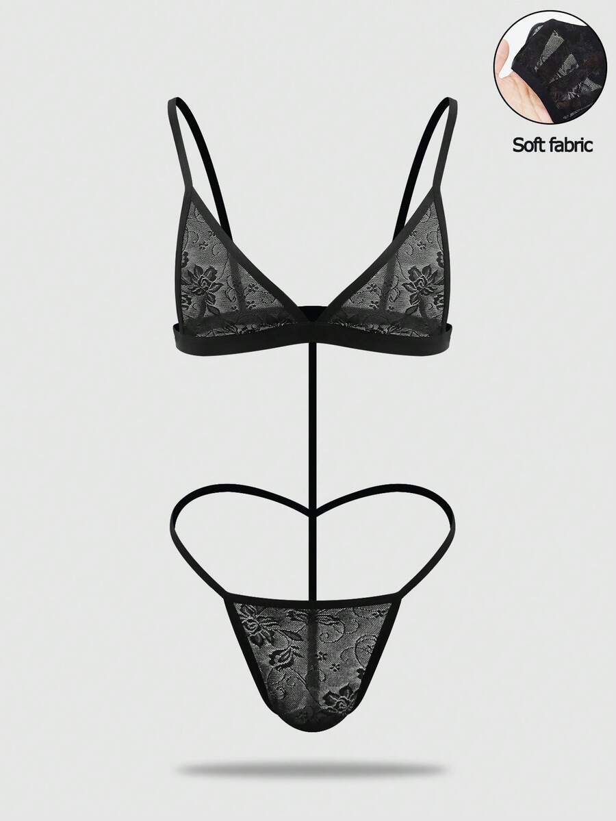 Men's black mesh thong underwear featuring a low-rise fit and backless design.