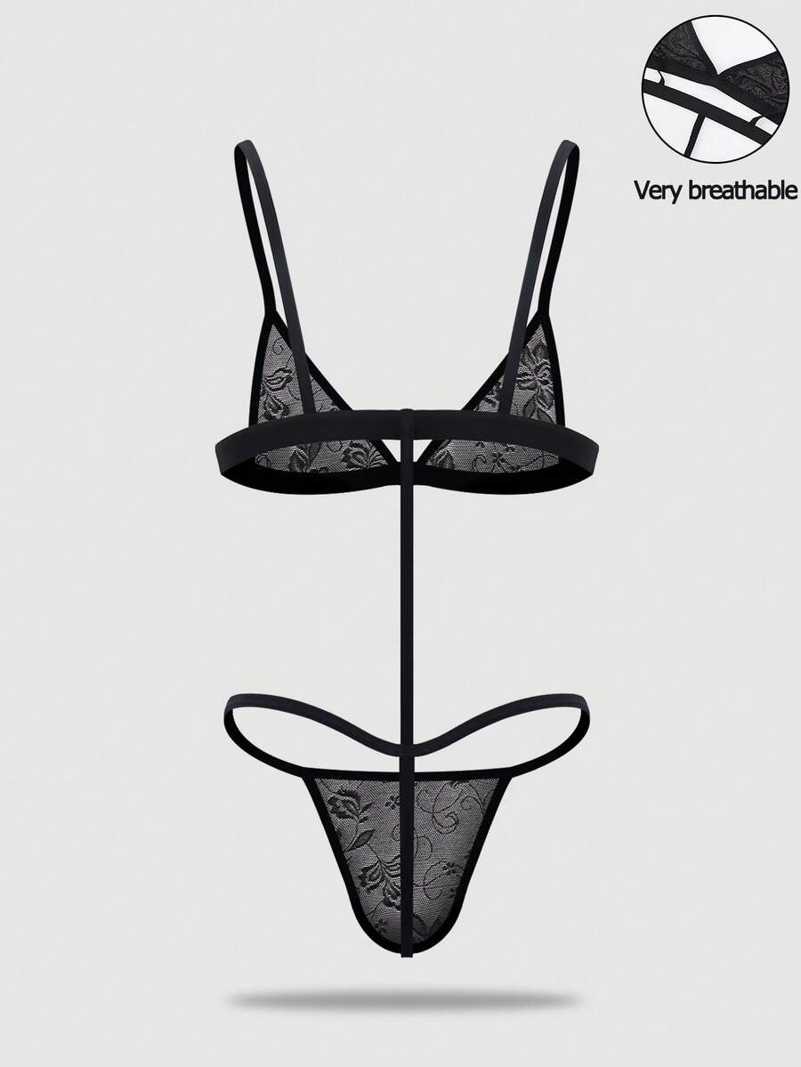Men's black mesh thong underwear featuring a low-rise fit and backless design.