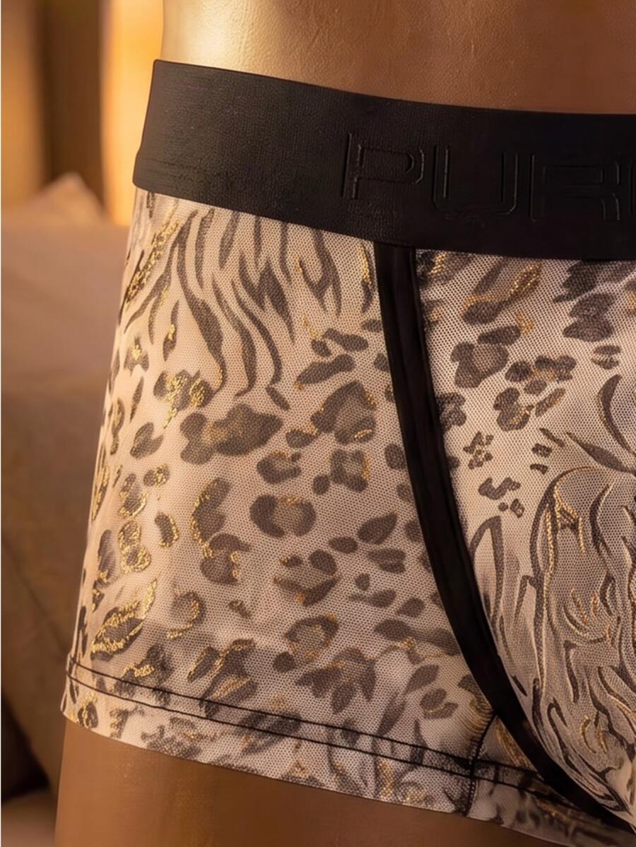 Men's grey low-rise boxer shorts featuring front bow detail and contrast binding.