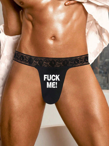 Black men's low rise thong underwear featuring a letter printed waistband and tape details.
