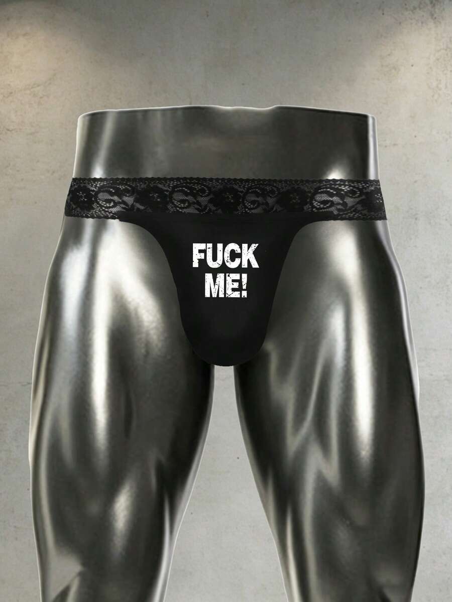 Black men's low rise thong underwear featuring a letter printed waistband and tape details.