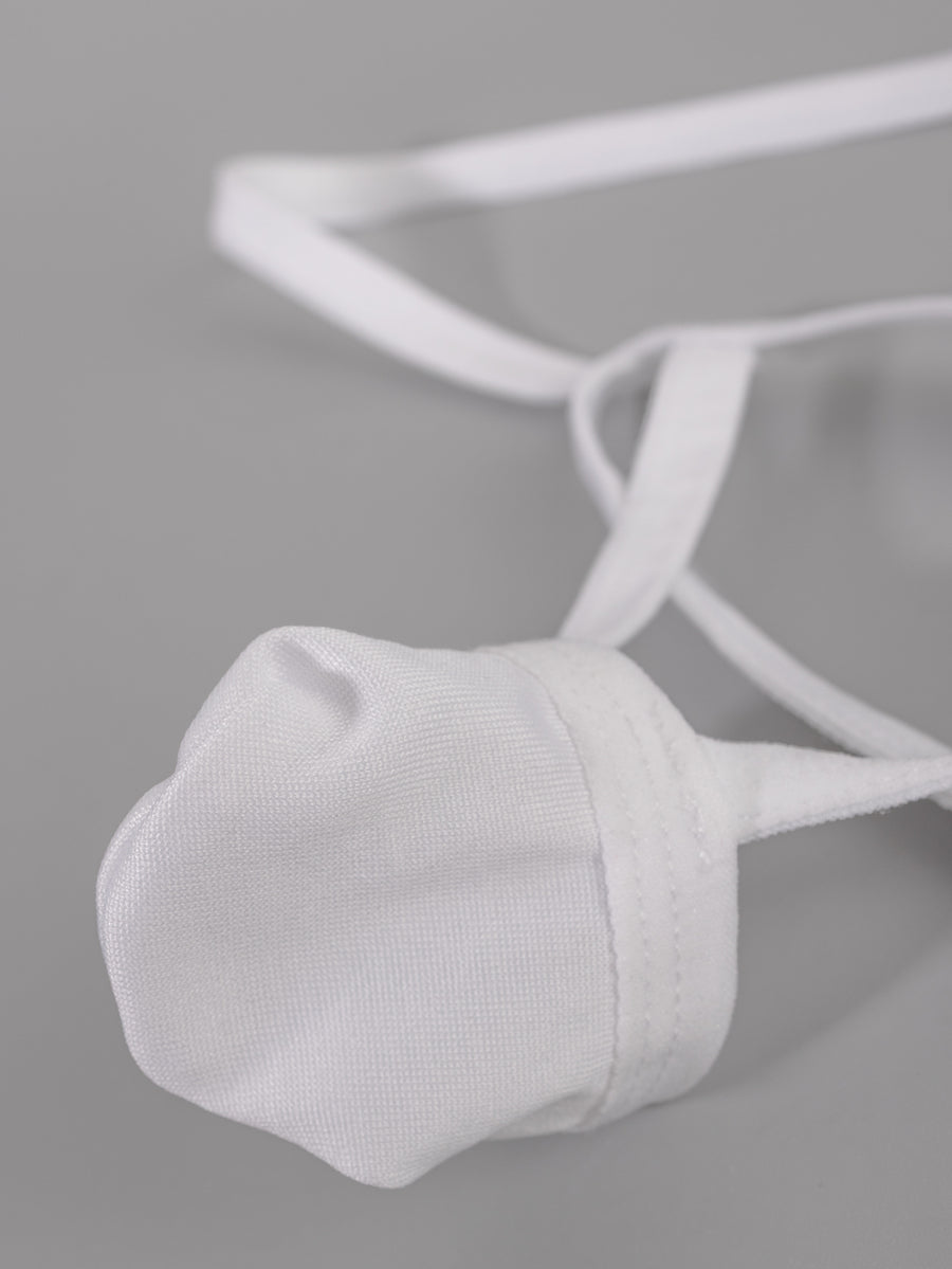Men's solid white low-rise thong underwear featuring a U-convex contour pouch design.