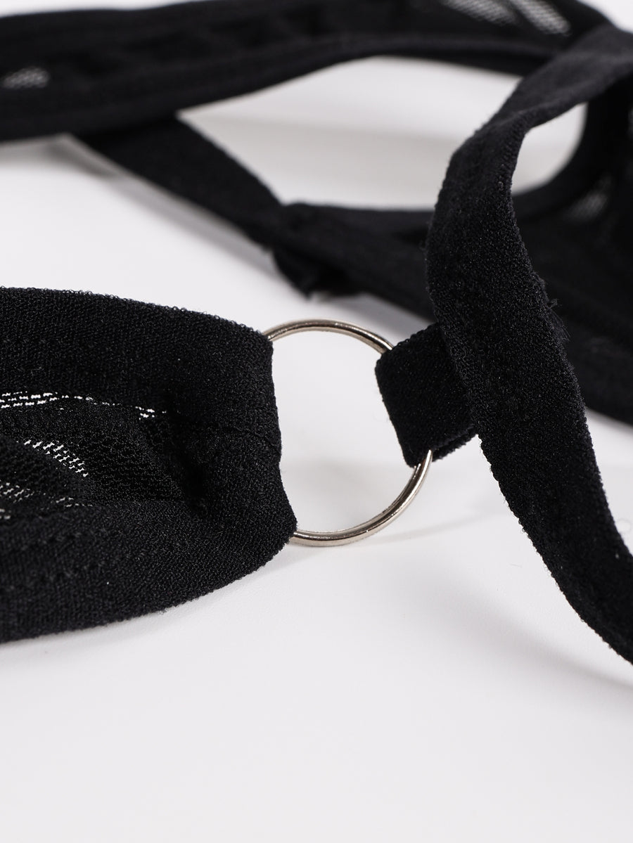 Black men's mesh thong underwear with low-rise waist and U-convex design.