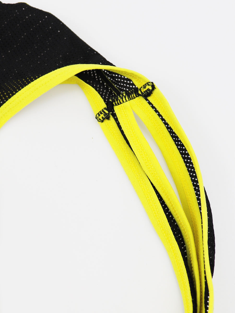 Black mid-rise men's jockstrap underwear featuring bold yellow trim and patterned waistband.